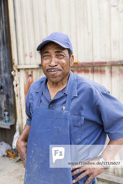 African American worker smiling