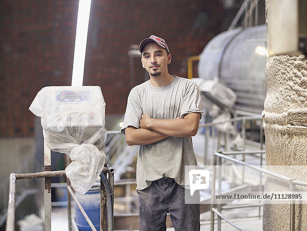 Hispanic worker in factory
