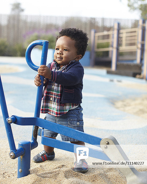 African American baby playing in park