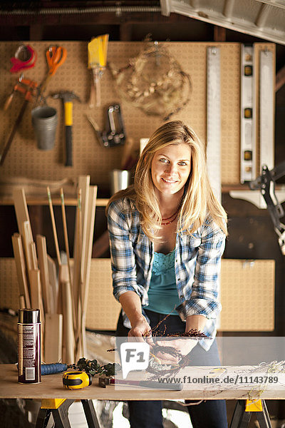 Artisan working in garage workshop