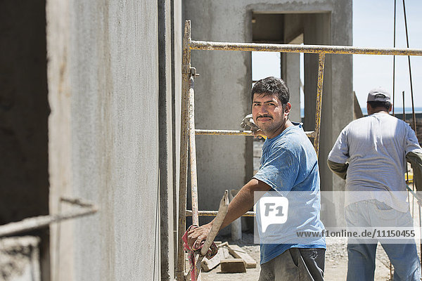 Hispanic construction worker at construction site