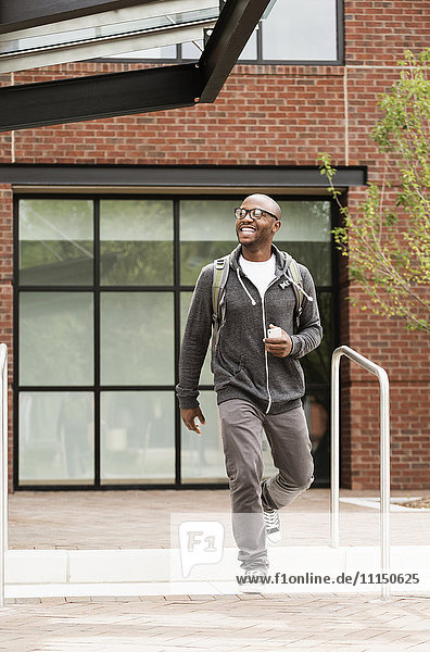 Black man walking in city