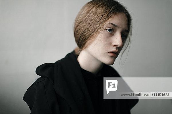 Caucasian woman with serious expression