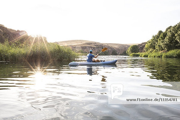 Spain  Segovia  Man in a canoe in Las Hoces del Rio Duraton