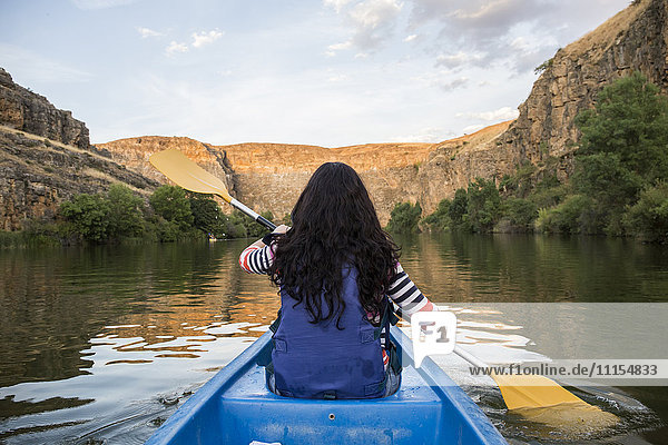 Spain  Segovia  Woman in a canoe in Las Hoces del Rio Duraton