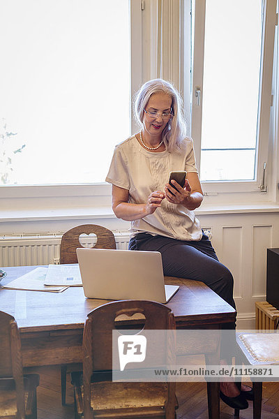 Businesswoman working at home office