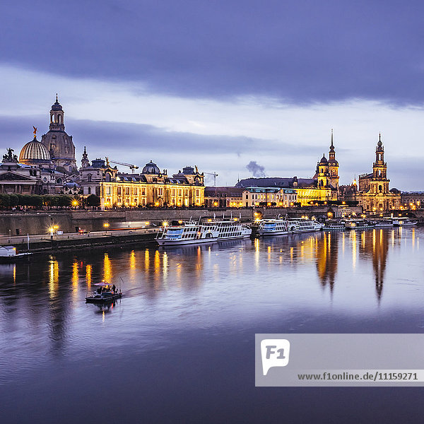 Germany  Saxony  Dresden  historic old town with Elbe River in the foreground in the evening