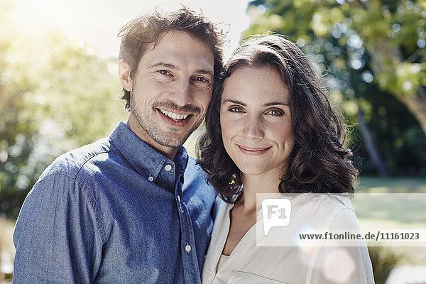 Portrait of smiling couple in park