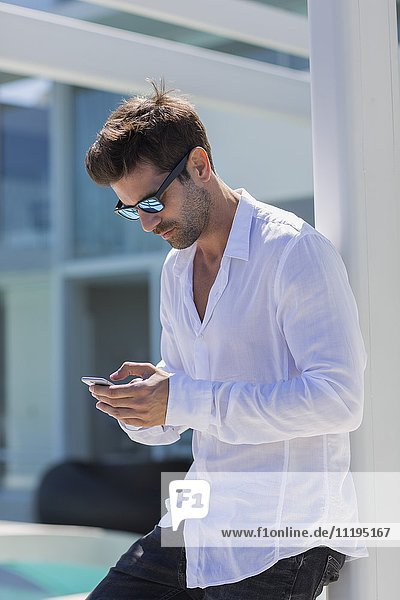 Close-up of a man using a smart phone