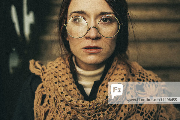 Caucasian woman wearing scarf and eyeglasses