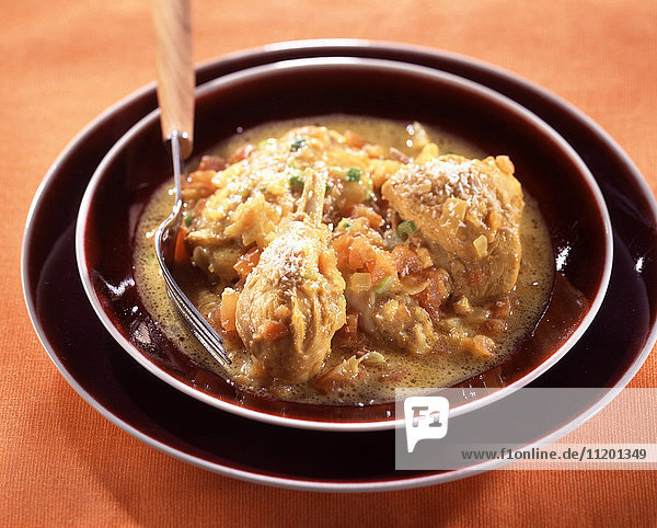 Chicken cooked with coconut milk