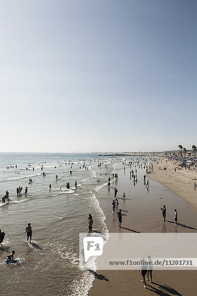 High angle view of people on beach against clear sky  Newport Beach  California  USA