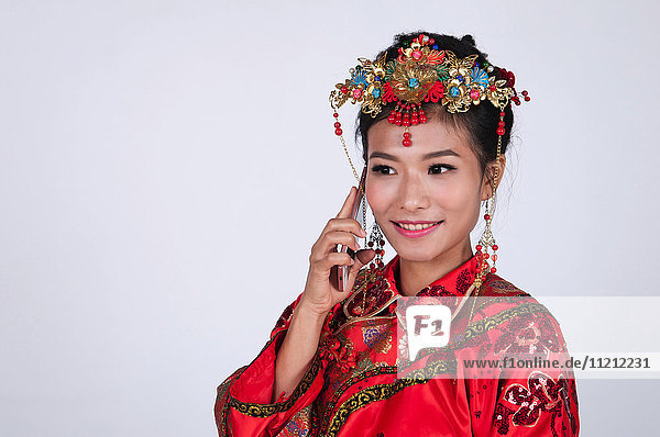 Chinese Bride making a phone call
