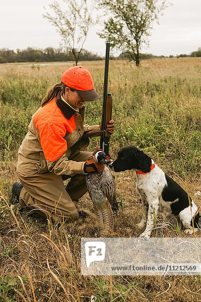 Woman And Springer Spaniel Upland Bird Hunting