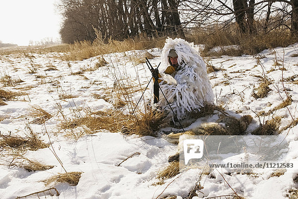 Varmint Hunter In Ghillie Snow Suit