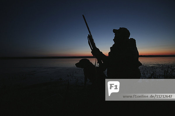 Waterfowl Hunter With Dog