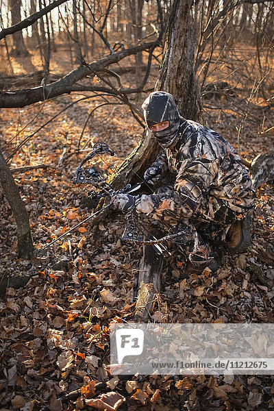 Hunter Ground Stalking Whitetail Deer