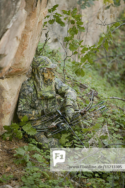 Bowhunter Hunting Turkey In Spring