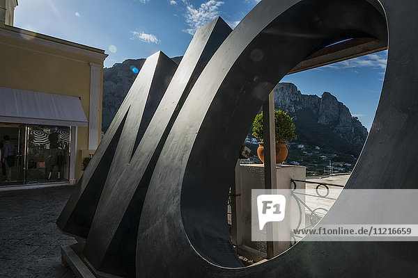 Sculpture of the word 'no' with a view of the mediterranean sea; Capri  Campania  Italy