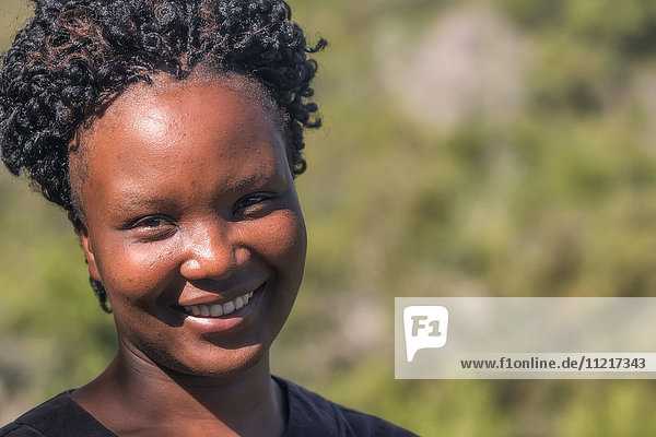 'Portrait of an African woman smiling; South Africa'