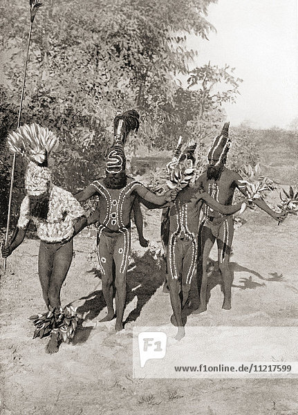 A corroboree  an event where Australian Aborigines interact with the Dreamtime through dance  music and costume. Bodies are painted in different ways  and special adornments are worn. After a 19th century photograph. From Customs of The World  published c.1913.