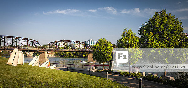 'South Saskatchewan River with bridge and promenade; Saskatoon  Saskatchewan  Canada'