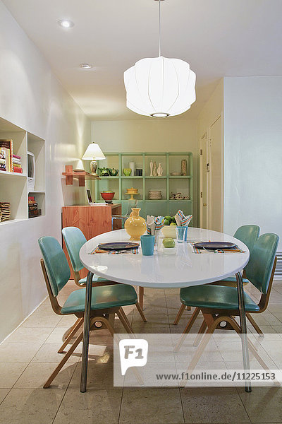 Retro style dining table in contemporary home