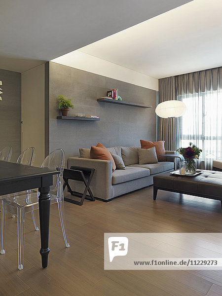 Modern living room and dining room with hardwood floors