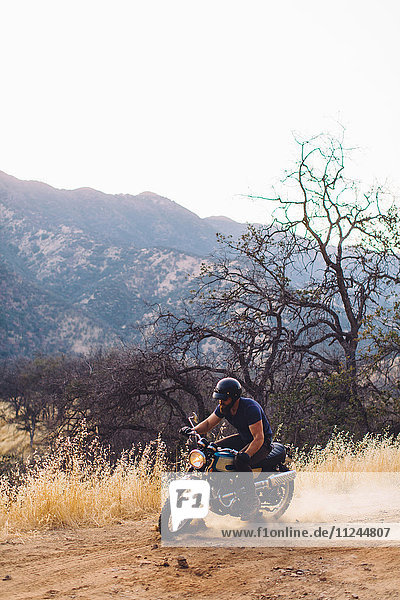 Man riding motorbike  Sequoia National Park  California  USA