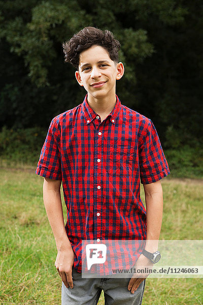 Portrait of teenage boy  outdoors  smiling