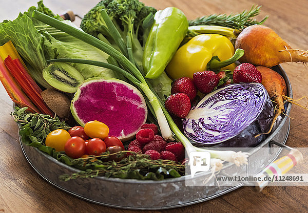Fruit  vegetables and herbs on tray