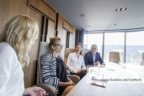 Business people having a meeting in board room