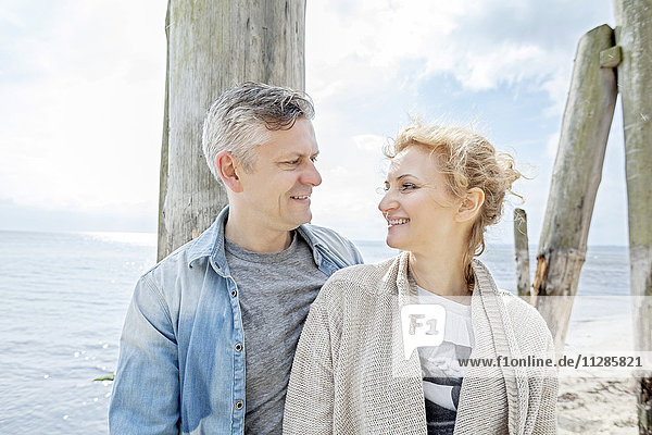Portrait of couple in love on beach
