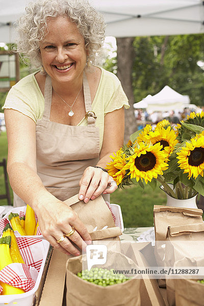 Grocer at Farmers Market