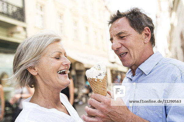 Happy senior couple with ice cream cone