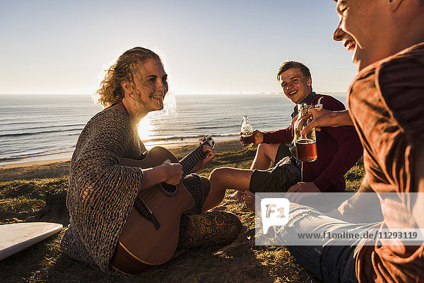 Three friends having fun at seaside