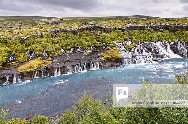 The waterfalls Hraunfossar of the river Hvita near the village Husafell in west Iceland.