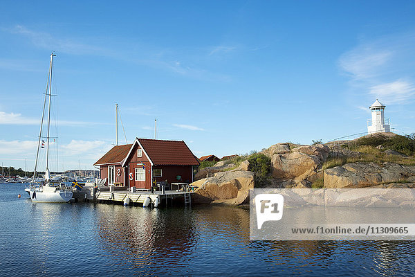 Sailing boats moored at coast