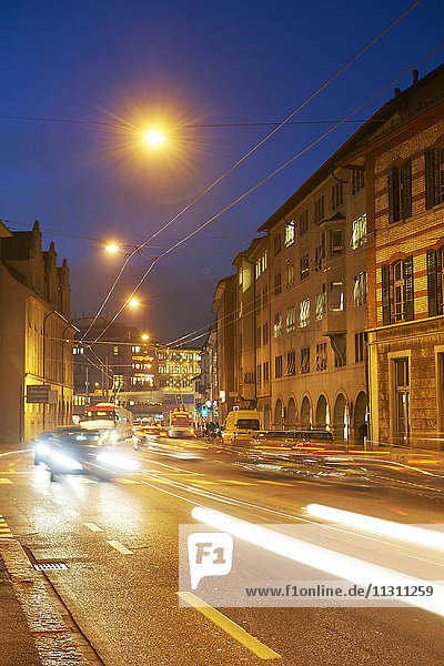 Winterthur  canton Zurich  Switzerland  Europe  at night  night  town  city  lights  traffic  dusk  twilight  blue hour  cars  automobiles  tram  streetcar  real estate  houses  homes  Technikumstrasse