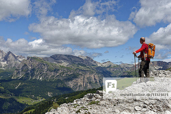 Italy  Alto Adige  Dolomites  Hiker looking at Puez Geisler Nature Park
