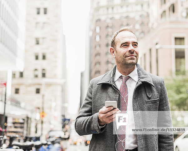 USA  New York City  businessman on the move in Manhattan