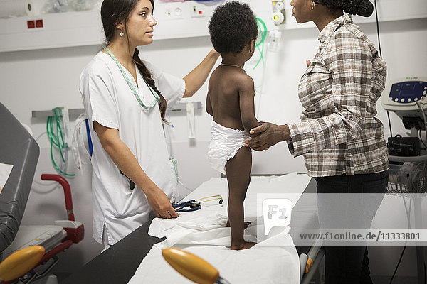 Reportage in the pediatric emergency unit in a hospital in Haute-Savoie  France. A doctor talks to the mother of a young patient.