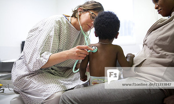 Reportage in the pediatric emergency unit in a hospital in Haute-Savoie  France. A doctor examines a young patient.