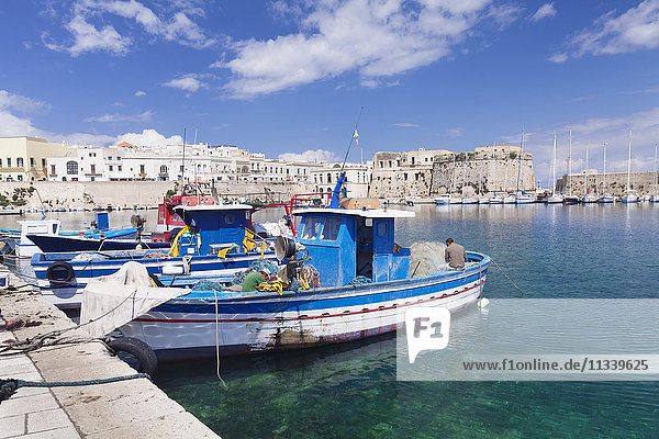 Fishing boats at the port  old town with castle  Gallipoli  Lecce province  Salentine Peninsula  Puglia  Italy  Mediterranean  Europe