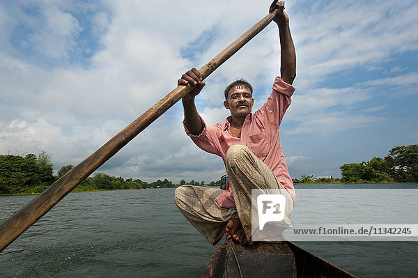 A fisherman on Kaptai Lake  Chittagong Hill Tracts  Bangladesh  Asia