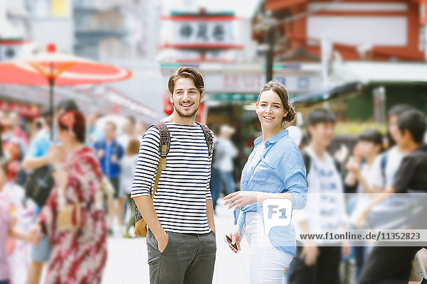 Caucasian couple enjoying sightseeing in Tokyo  Japan