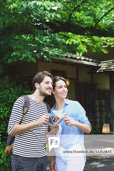 Caucasian couple enjoying sightseeing in Tokyo  Japan