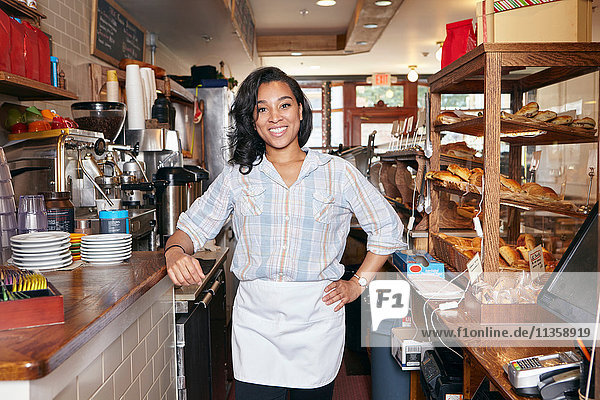 Portrait of female worker in bakery