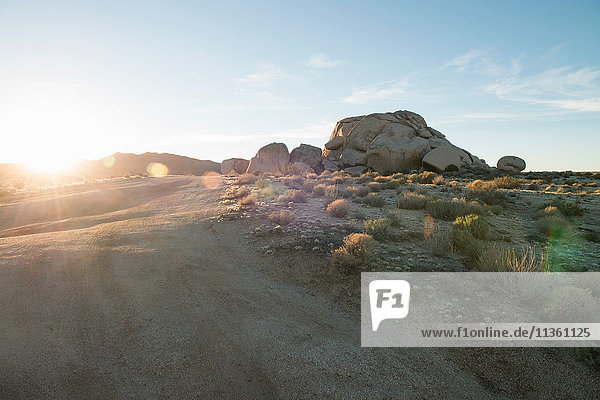 Sunset and rock formation  Mojave Desert  California  USA