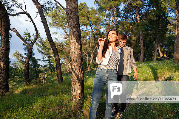 Young couple strolling in coastal forest  Split  Dalmatia  Croatia